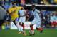 Gomes in action against Brazil.