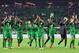 Nigeria's players celebrate after an international friendly football match between Argentina and Nigeria in Krasnodar on November 14, 2017. / AFP PHOTO / Mladen ANTONOV (Photo credit should read MLADEN ANTONOV/AFP/Getty Images)