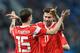 Russia's Aleksey Miranchuk (15) celebrates with Fedor Smolov after scoring a goal during an international friendly football match between Russia and Spain at the Saint Petersburg Stadium in Saint Petersburg on November 14, 2017. / AFP PHOTO / Kirill KUDRY