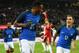 France's defender Lucas Digne (R) celebrates with teammate Anthony Martial after Alexandre Lacazette scored a goal during the international friendly football match Germany against France in Cologne on November 14, 2017. / AFP PHOTO / PATRIK STOLLARZ