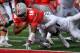 COLUMBUS, OH - NOVEMBER 11: Quarterback J.T. Barrett #16 of the Ohio State Buckeyes scores on a four-yard touchdown run in the second quarter against the Michigan State Spartans at Ohio Stadium on November 11, 2017 in Columbus, Ohio. (Photo by Jamie Sab
