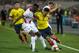 Colombia's Radamel Falcao (R) fights for the ball with Peru's Christian Ramos during their 2018 World Cup qualifier football match in Lima, on October 10, 2017. / AFP PHOTO / Ernesto BENAVIDES (Photo credit should read ERNESTO BENAVIDES/AFP/Getty I