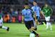 Uruguay's Luis Suarez vies for the ball during their 2018 World Cup football qualifier match in Montevideo, on October 10, 2017. / AFP PHOTO / Pablo PORCIUNCULA (Photo credit should read PABLO PORCIUNCULA/AFP/Getty Images)
