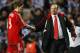Liverpool manager Rafa Benitez (R) shakes hands with player Steven Gerrard after they lost to Chelsea during a UEFA Champions League semi-final game at Stamford Bridge in London, on April 30, 2008. AFP PHOTO/ADRIAN DENNIS (Photo credit should read ADRIAN