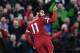 Liverpool's Egyptian midfielder Mohamed Salah celebrates scoring his team's first goal during the English Premier League football match between Liverpool and Southampton at Anfield in Liverpool, north west England on November 18, 2017. / AFP PHOTO / Paul