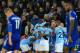 Manchester City's Belgian midfielder Kevin De Bruyne (centre R) is mobbed by teammates after scoring his team's second goal during the English Premier League football match between Leicester City and Manchester City at King Power Stadium in Leicester, cen