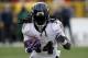 GREEN BAY, WI - NOVEMBER 19: Alex Collins #34 of the Baltimore Ravens runs with the ball in the fourth quarter against the Green Bay Packers at Lambeau Field on November 19, 2017 in Green Bay, Wisconsin. (Photo by Dylan Buell/Getty Images)