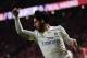 Real Madrid's Spanish midfielder Isco thumbs up during the Spanish league football match Atletico Madrid vs Real Madrid at the Wanda Metropolitan stadium in Madrid on November 18, 2017. / AFP PHOTO / PIERRE-PHILIPPE MARCOU (Photo credit should read