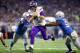 DETROIT, MI - NOVEMBER 23: Quarterback Case Keenum #7 of the Minnesota Vikings runs with the ball against Anthony Zettel #69 of the Detroit Lions and Tahir Whitehead #59 for a touchdown against the Detroit Lions during the first half at Ford Field on Nove
