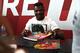 Ngannou signs autographs at a recent UFC sponsor event.