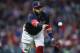 CLEVELAND, OH - SEPTEMBER 30: Carlos Santana #41 of the Cleveland Indians throws out Adam Engel #41 of the Chicago White Sox at first base during the seventh inning at Progressive Field on September 30, 2017 in Cleveland, Ohio. The White Sox defeated the