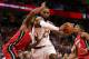 CLEVELAND, OH - NOVEMBER 28: LeBron James # 23 Cleveland Cavaliers drives between Dion Waiters # 11 and Josh Richardson # 0 of the Miami Heat during the second half at Quicken Loans Arena on November 28, 2017 in Cleveland, Ohio Cleveland won the game