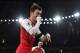 Arsenal's German midfielder Mesut Ozil celebrates scoring their fourth goal during the English Premier League football match between Arsenal and Huddersfield Town at the Emirates Stadium in London on November 29, 2017. / AFP PHOTO / Ben STANSALL / RESTRI