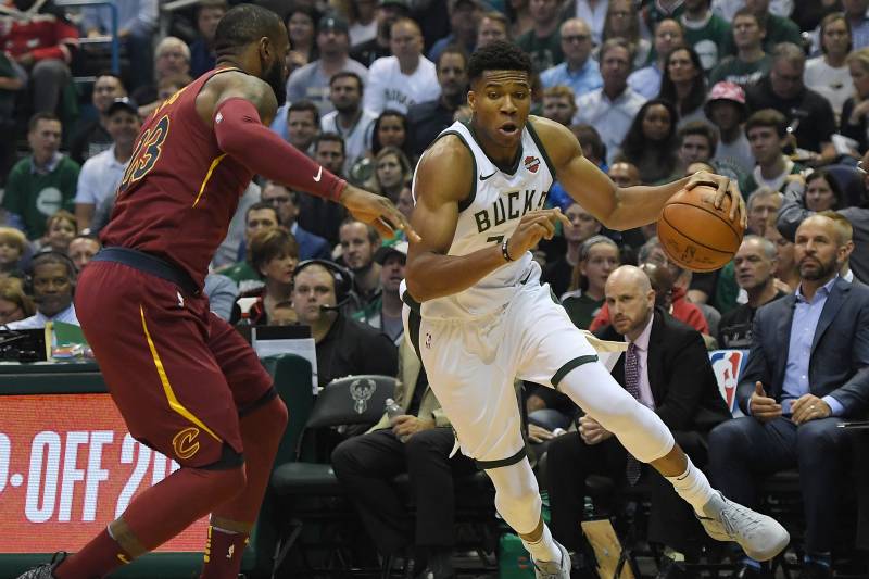 MILWAUKEE, WI - OCTOBER 20: Giannis Antetokounmpo #34 of the Milwaukee Bucks works against LeBron James #23 of the Cleveland Cavaliers during a game at the Bradley Center on October 20, 2017 in Milwaukee, Wisconsin. NOTE TO USER: User expressly acknowle
