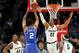Miles Bridges contests a Gary Trent Jr. jumper.