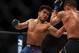 7DETROIT, MI - DECEMBER 02: Henry Cejudo (L) battles Sergio Pettis (R) during UFC 218 at Little Ceasars Arena on December 2, 2018 in Detroit, Michigan. (Photo by Gregory Shamus/Getty Images)