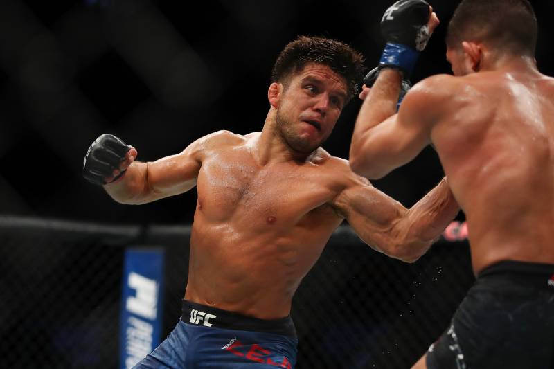 7DETROIT, MI - DECEMBER 02: Henry Cejudo (L) battles Sergio Pettis (R) during UFC 218 at Little Ceasars Arena on December 2, 2018 in Detroit, Michigan. (Photo by Gregory Shamus/Getty Images)