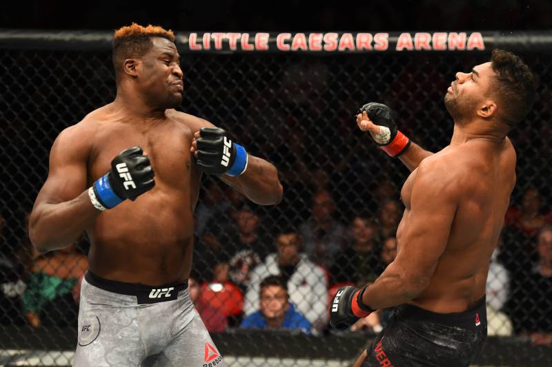DETROIT, MI - DECEMBER 02: (L-R) Francis Ngannou of Cameroon punches Alistair Overeem of The Netherlands in their heavyweight bout during the UFC 218 event inside Little Caesars Arena on December 02, 2017 in Detroit, Michigan. (Photo by Josh Hedges/Zuffa