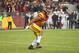 SANTA CLARA, CA - DECEMBER 01: Uchenna Nwosu #42 of the USC Trojans celebrate after Nwosu stopped Cameron Scarlett #22 of the Stanford Cardinal a yard short of the goal line on fourth down during the Pac-12 Football Championship Game at Levi's Stadium on