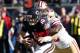 CHICAGO, IL - DECEMBER 03: Quarterback Mitchell Trubisky #10 of the Chicago Bears is sacked by Elvis Dumervil #58 of the San Francisco 49ers in the first quarter at Soldier Field on December 3, 2017 in Chicago, Illinois. The San Francisco 49ers defeate