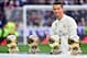 TOPSHOT - Real Madrid's Portuguese forward Cristiano Ronaldo poses with his four Ballon d'Or France Football trophies before the Spanish league football match Real Madrid CF vs Granada FC at the Santiago Bernabeu stadium in Madrid on January 7, 2017. / AF