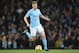 Manchester City's Belgian midfielder Kevin De Bruyne runs with the ball during the English Premier League football match between Manchester City and West Ham United at the Etihad Stadium in Manchester, north west England, on December 3, 2017. / AFP PHOTO