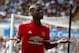 Manchester United's French midfielder Paul Pogba celebrates scoring the team's fourth goal during the English Premier League football match between Swansea City and Manchester United at The Liberty Stadium in Swansea, south Wales on August 19, 2017. / AFP