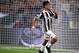 Juventus' forward from Argentina Paulo Dybala celebrates after scoring a goal during the italian Serie A football match Juventus vs Torino in Turin on September 23, 2017. / AFP PHOTO / FILIPPO MONTEFORTE (Photo credit should read FILIPPO MONTEFORT