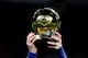 BARCELONA, SPAIN - JANUARY 17: Lionel Messi of FC Barcelona holds up the FIFA Ballon d'Or trophy prior to the La Liga match between FC Barcelona and Athletic Club de Bilbao at Camp Nou on January 17, 2016 in Barcelona, Spain. (Photo by David Ramos/Gett