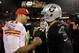 OAKLAND, CA - NOVEMBER 20: Derek Carr #4 of the Oakland Raiders shakes hands with Alex Smith #11 of the Kansas City Chiefs after the Raiders beat the Chiefs for their first win of the season at O.co Coliseum on November 20, 2014 in Oakland, California.