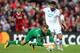 LIVERPOOL, ENGLAND - AUGUST 23: Simon Mignolet of Liverpool collects the ball from Kerem Demirbay of Hoffenheim during the UEFA Champions League Qualifying Play-Offs round second leg match between Liverpool FC and 1899 Hoffenheim at Anfield on August 23,