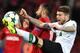 Liverpool's defender from Spain Alberto Moreno (R) and Spartak Moscow's midfielder from Russia Alexander Samedov vie for the ball during the UEFA Champions League Group E football match between FC Spartak Moscow and Liverpool FC at the Otkrytie Arena stad