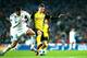MADRID, SPAIN - DECEMBER 06: Christian Pulisic of Borussia Dortmund is challenged by Hernandez Theo of Real Madrid during the UEFA Champions League group H match between Real Madrid and Borussia Dortmund at Estadio Santiago Bernabeu on December 6, 2017 in