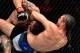 Ortega locks up the choke the finishes Cub Swanson.