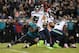 JACKSONVILLE, FL - DECEMBER 10: Russell Wilson #3 of the Seattle Seahawks is tackled by Yannick Ngakoue #91 of the Jacksonville Jaguars during the second half of their game at EverBank Field on December 10, 2017 in Jacksonville, Florida. (Photo by Logan