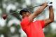 Tigers Woods of the US hits a shot during the final round of the 77th Masters golf tournament at Augusta National Golf Club on April 14, 2013 in Augusta, Georgia. AFP PHOTO / JEWEL SAMAD (Photo credit should read JEWEL SAMAD/AFP/Getty Images)