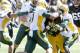 IOWA CITY, IOWA- SEPTEMBER 17: Running back LeShun Daniels #29 of the Iowa Hawkeyes is wrapped up during the fourth quarter by linebacker Nick DeLuca #49 and cornerback Jalen Allison #21 of the North Dakota State Bison on September 17, 2016 at Kinnick St