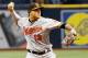 ST. PETERSBURG, FL - OCTOBER 1: Manny Machado #13 of the Baltimore Orioles throws a runner out in the bottom of the second inning of the game against the Tampa Bay Rays at Tropicana Field on October 1, 2017 in St. Petersburg, Florida. (Photo by Joseph Gar