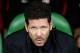 Atletico Madrid's Argentinian coach Diego Simeone attends the Spanish league football match between Real Betis and Atletico Madrid at the Benito Villamarin Stadium in Sevilla on December 10, 2017. / AFP PHOTO / CRISTINA QUICLER (Photo credit should