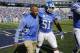 Love heads off the field after a win versus Eastern Michigan earlier this year.