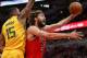 CHICAGO, IL - DECEMBER 13: Robin Lopez #42 of the Chicago Bulls puts up a shot past Derrick Favors #15 of the Utah Jazz at the United Center on December 13, 2017 in Chicago, Illinois. NOTE TO USER: User expressly acknowledges and agrees that, by download