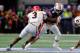 ATLANTA, GA - DECEMBER 02: Jarrett Stidham #8 of the Auburn Tigers is tackled by Roquan Smith #3 of the Georgia Bulldogs during the first half in the SEC Championship at Mercedes-Benz Stadium on December 2, 2017 in Atlanta, Georgia. (Photo by Kevin C. Co
