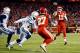 KANSAS CITY, MO - DECEMBER 16: Quarterback Alex Smith #11 of the Kansas City Chiefs passes to running back Kareem Hunt #27 for a touchdown during the game against the Los Angeles Chargers at Arrowhead Stadium on December 16, 2017 in Kansas City, Missouri