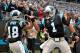 CHARLOTTE, NC - DECEMBER 17: Damiere Byrd #18 celebrates with teammate Cam Newton #1 of the Carolina Panthers after a touchdown against the Green Bay Packers in the fourth quarter during their game at Bank of America Stadium on December 17, 2017 in Charl