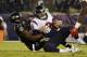BALTIMORE, MD - NOVEMBER 27: Quarterback Tom Savage #3 of the Houston Texans is sacked by outside linebacker Terrell Suggs #55 of the Baltimore Ravens in the second quarter at M&T Bank Stadium on November 27, 2017 in Baltimore, Maryland. (Photo by Scott T