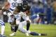 Baltimore Ravens wide receiver Mike Wallace makes a catch against Indianapolis Colts linebacker Barkevious Mingo.