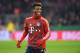 Bayern Munich's French forward Kingsley Coman laughs during the warm up prior the German football Cup DFB Pokal round of sixteen match Bayern Munich vs Borussia Dortmund in Munich, southern Germany, on December 20, 2017. / AFP PHOTO / CHRISTOF STACHE