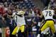 HOUSTON, TX - DECEMBER 25: Ben Roethlisberger #7 of the Pittsburgh Steelers looks to pass in the first quarter as Alejandro Villanueva #78 blocks Jadeveon Clowney #90 of the Houston Texans at NRG Stadium on December 25, 2017 in Houston, Texas. (Photo by