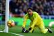 Real Madrid's Costa Rican goalkeeper Keylor Navas eyes the ball during the Spanish League 'Clasico' football match Real Madrid CF vs FC Barcelona at the Santiago Bernabeu stadium in Madrid on December 23, 2017. / AFP PHOTO / JAVIER SORIANO (Photo