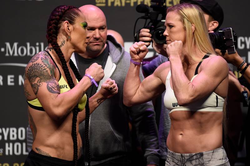 LAS VEGAS, NV - DECEMBER 29: (L-R) Cris Cyborg of Brazil and Holly Holm face off during the UFC 219 weigh-in inside T-Mobile Arena on December 29, 2017 in Las Vegas, Nevada. (Photo by Jeff Bottari/Zuffa LLC/Zuffa LLC via Getty Images)